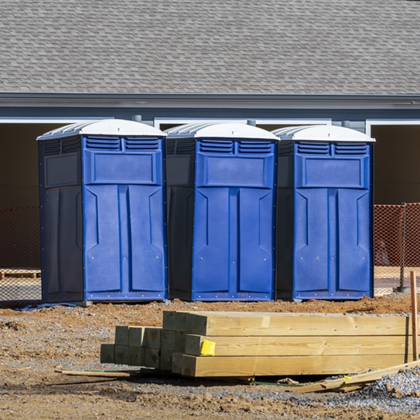 what is the cost difference between standard and deluxe portable toilet rentals in Hamilton Georgia